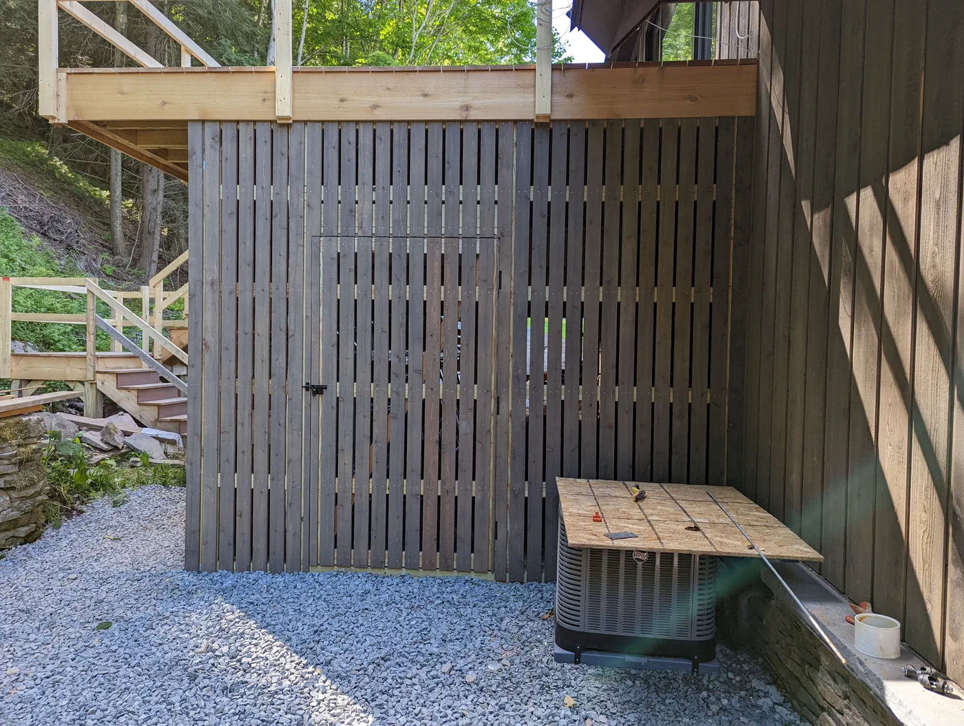 Slatted wood screen for outdoor equipment