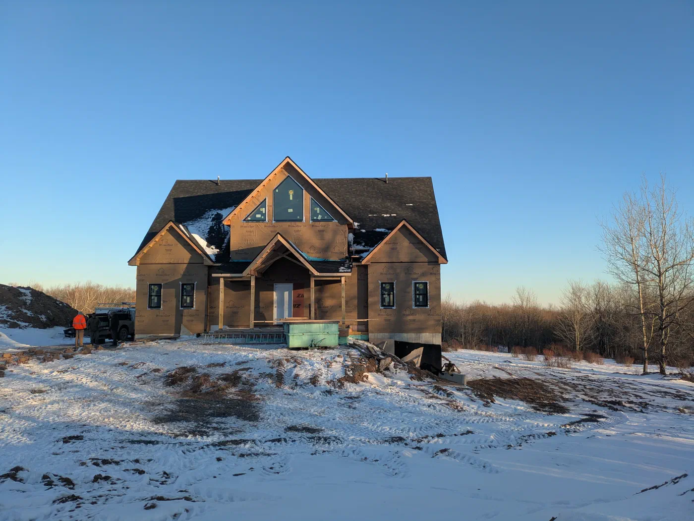 Gabled home taking shape on a clear winter day