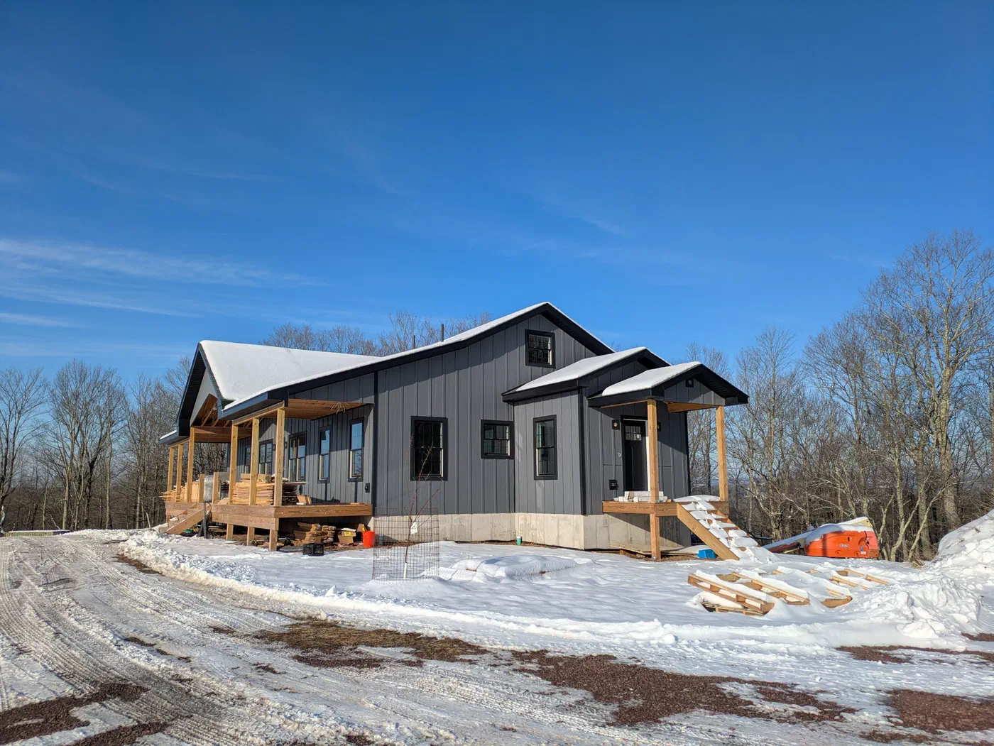 Board-and-batten with covered porches at both ends