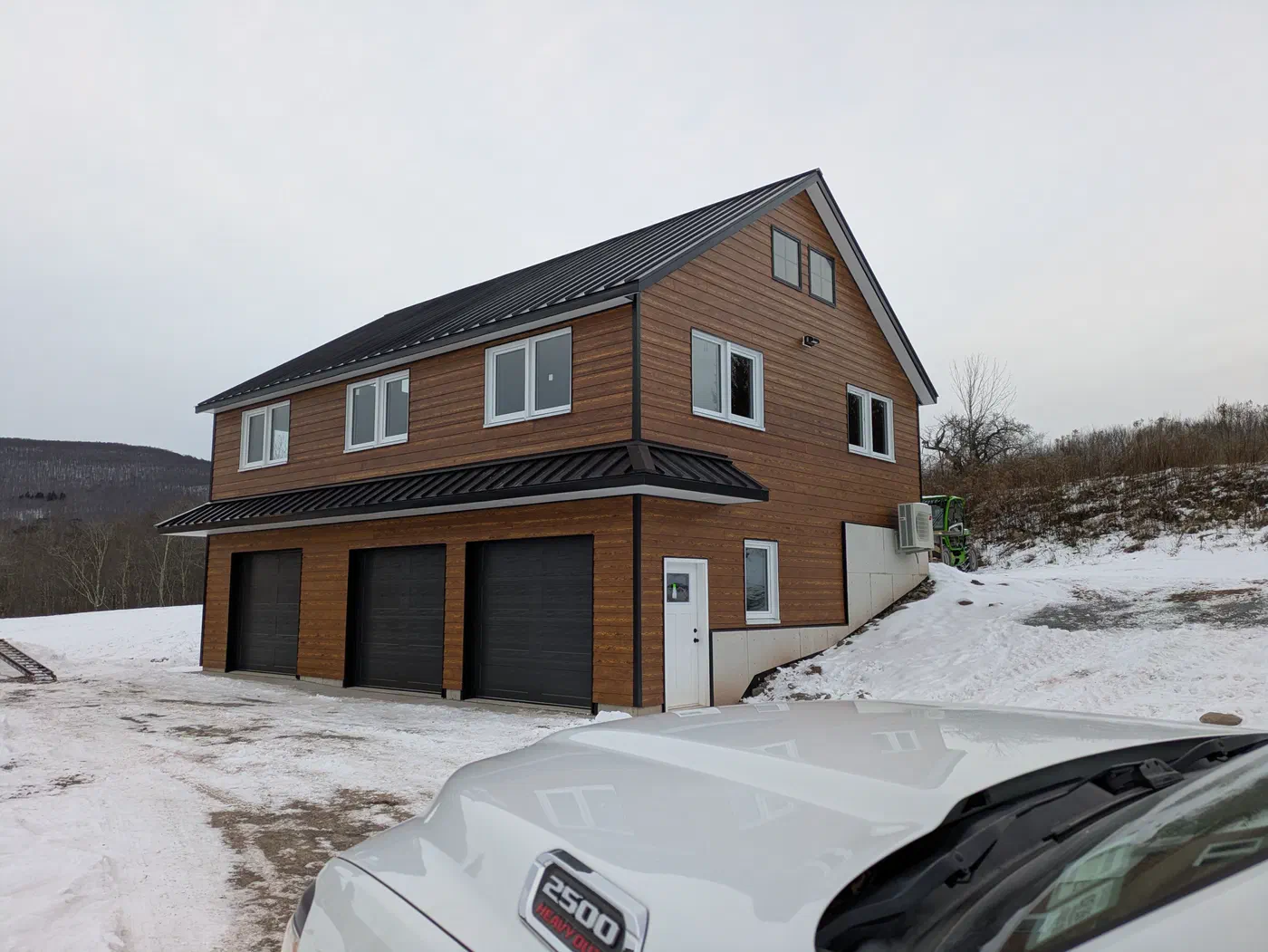 Three-bay garage with a second story
