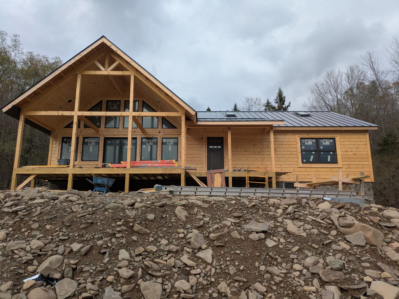 Timber-frame gable over the covered deck